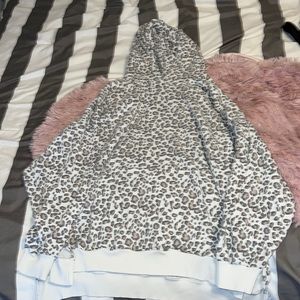 American Eagle cheetah print sweater with hood.
